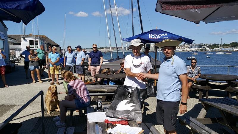 Malcolm Davies receives first prize from Steve Roberts TMSC dinghy secretary at the Torpoint Mosquito Solo Open - photo © Richard Woods