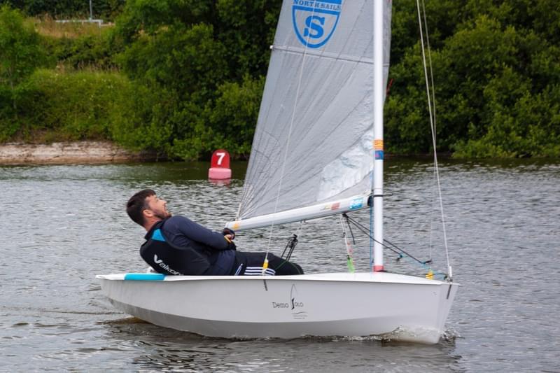 Paul Burgoine in the Demo Boat during the Shustoke Solo Open photo copyright Paul Collins taken at Shustoke Sailing Club and featuring the Solo class