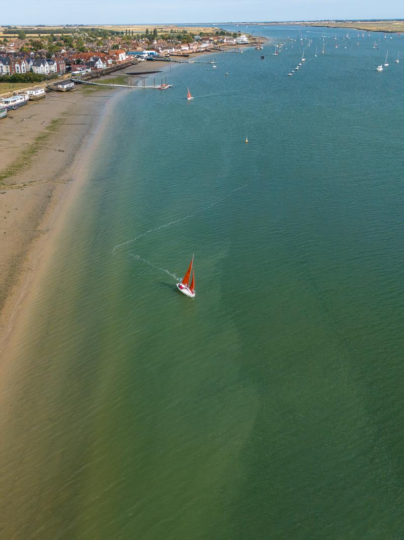 Squibs National Champions Micky Wright and Alex Porteous, Spoof 811, lead the fleet during the 6th day of Burnham Week 2024 photo copyright Petru Balau Sports Photography / sports.hub47.com taken at Royal Corinthian Yacht Club, Burnham and featuring the Squib class