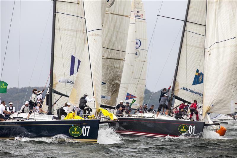 Crew work for the Larchmont YC (USA) and the RCN Barcelona (ESP) teams on day 3 of the New York Yacht Club Invitational Cup presented by Rolex photo copyright Daniel Forster / Rolex taken at New York Yacht Club and featuring the Swan 42 class