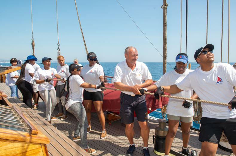 Admiral Giorgio Lazio from Nave Italia encourages the RCYC Sailing Academy while doing a teambuilding activity photo copyright Merlo Fotografia taken at Royal Cape Yacht Club and featuring the Tall Ships class