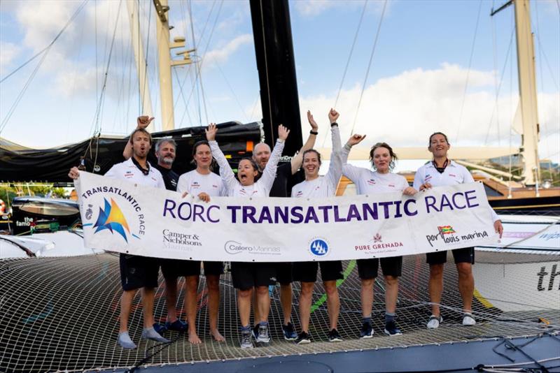 Limosa 'The Famous Project' celebrate in Port Louis - RORC Transatlantic Race photo copyright Arthur Daniel / RORC taken at Royal Ocean Racing Club and featuring the Trimaran class