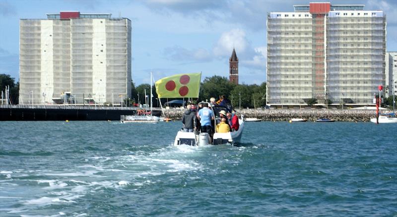 A Poona dhow crosses over to Gosport to board the Victories photo copyright Jeremy Atkins taken at Portsmouth Sailing Club and featuring the Victory class