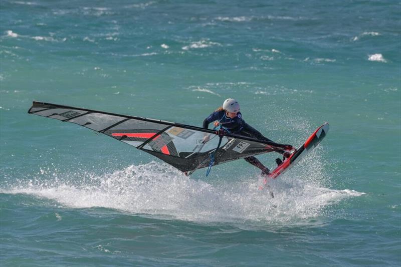 Elena Dominick with a buzzer beater Shaka - 2024 FPT Naxos photo copyright PROtography Official taken at  and featuring the Windsurfing class