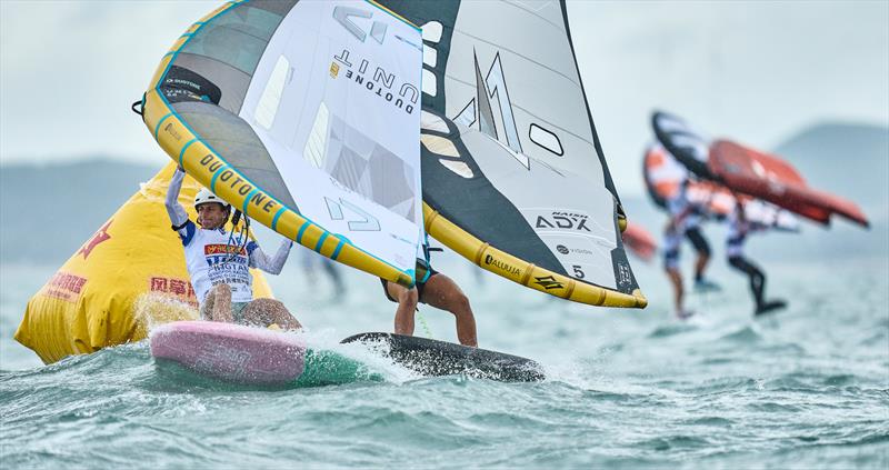 Karolina Kluszczynska putting in full effort at the mark rounding - 2024 WingFoil Racing World Cup China, Day 1 photo copyright IWSA media / Robert Hajduk taken at  and featuring the Wing Foil class